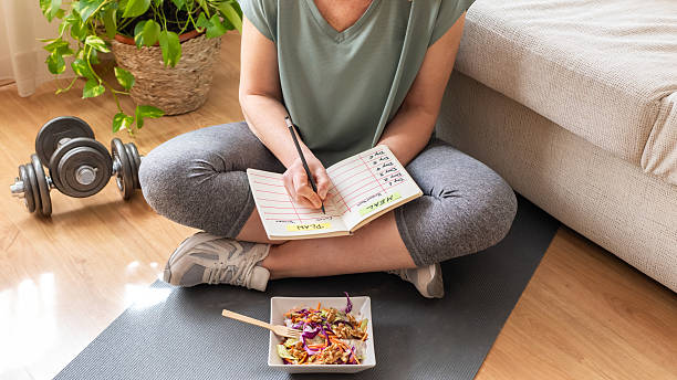 Mindful eating exercise with journal and balanced meal